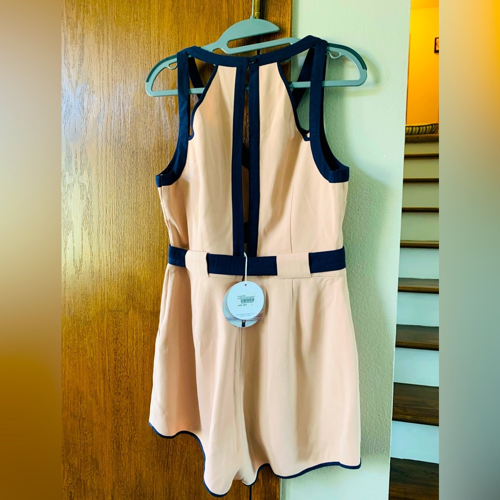 Express brand nude and navy, very pretty and large size sleeves less romper.